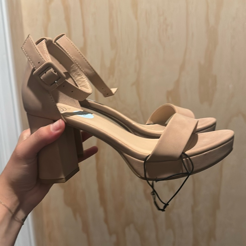 Nude open toed platform heels